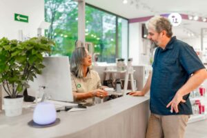 customer buying CBD at licensed dispensary in Marsh Lane